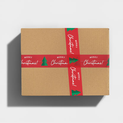 Festively wrapped box with red and green 'Merry Christmas' Shippy Tape.