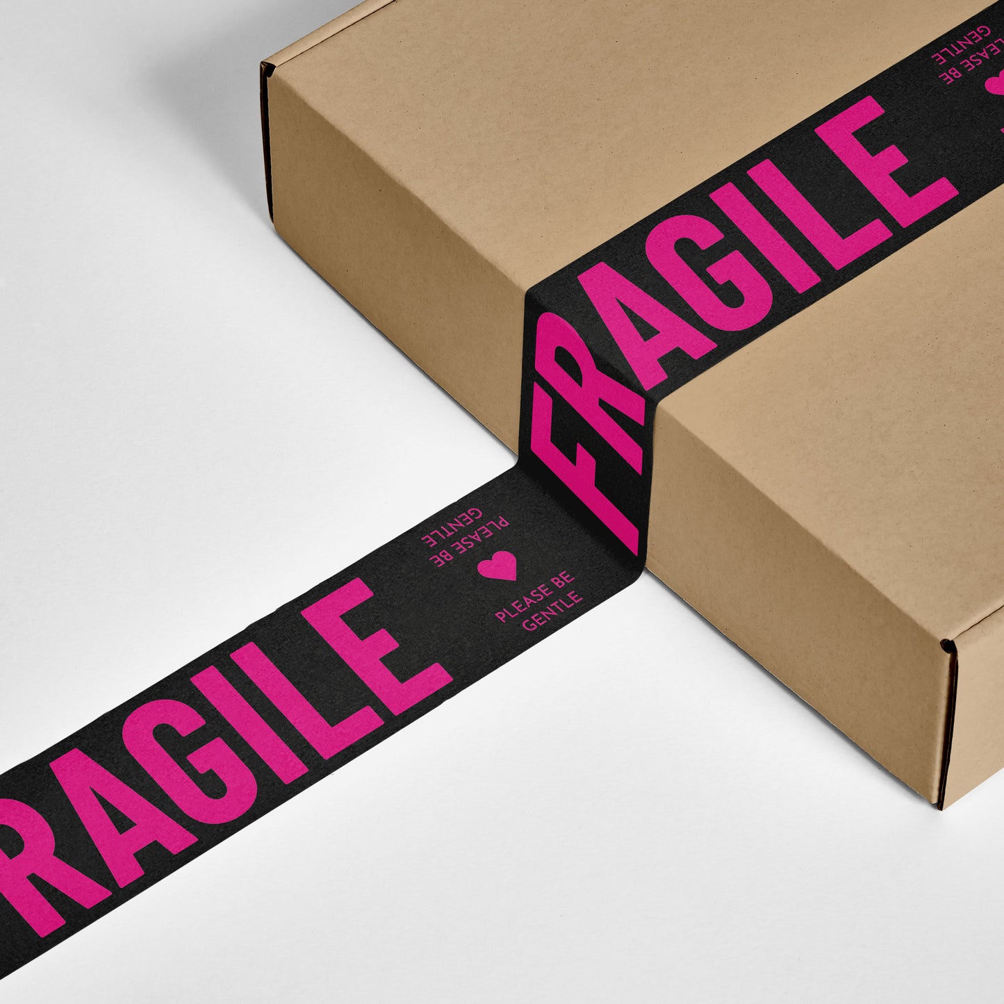 A gift box wrapped in unique Fragile printed packing tape.