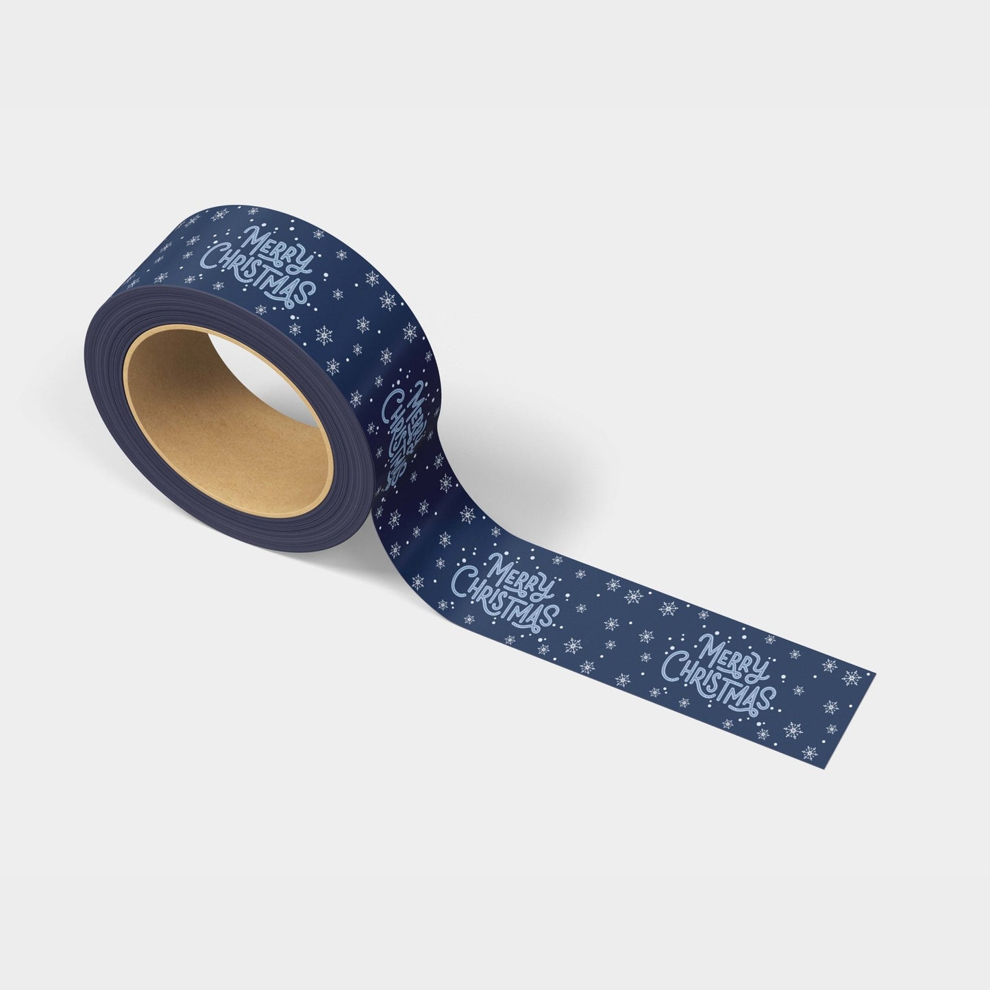 A roll of navy blue Merry Christmas Snow Shipping Tape by Shippy Tape.